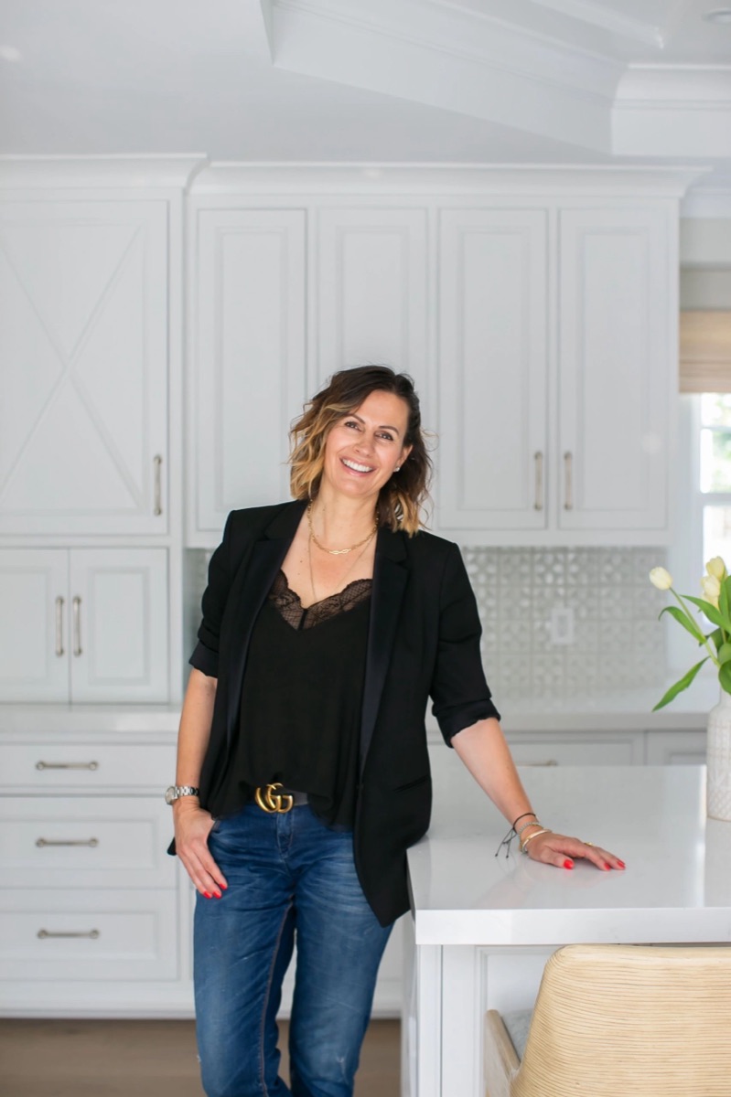 Daniela Z in a white kitchen she designed